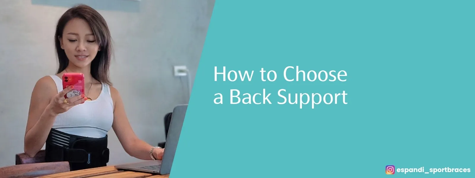 How to choose a back support: a woman at her desk wearing an Espandi back support